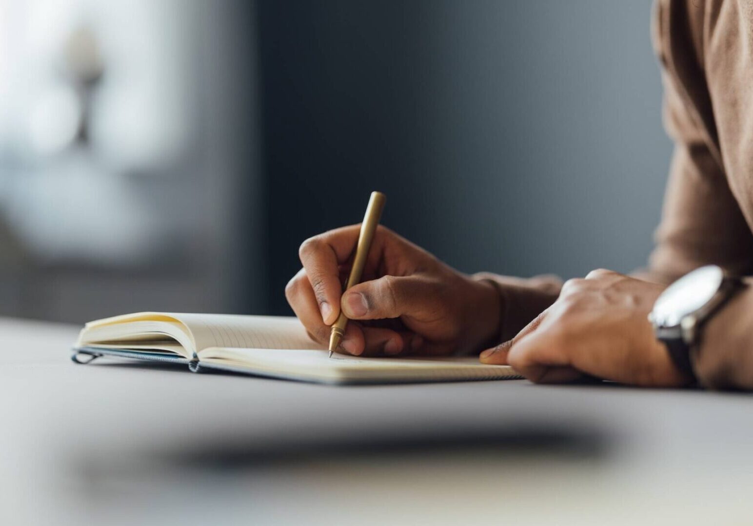 Close-up of writing in a notebook